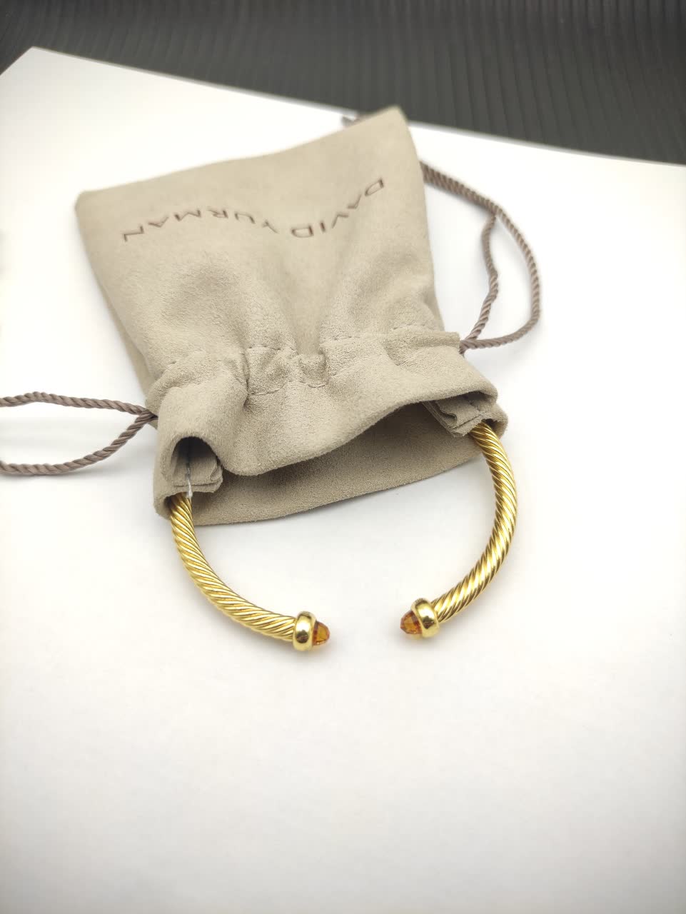 David Yurman Gold Tone Wire Bangle Bracelet with Orange Crystal Accents